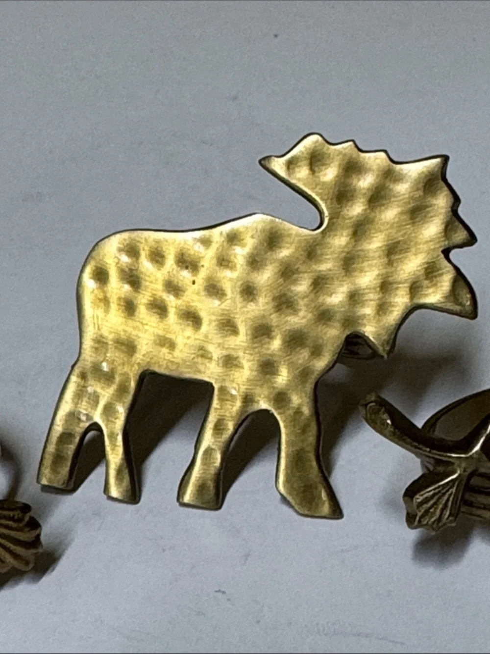 brass moose and pinecone and branch napkin rings set of 4